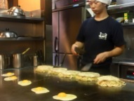 Cooking Okonomiyaki at Okonomiyaki Nagataya